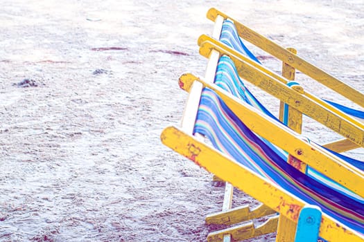 colorful Beach Chairs on the Coast sand beach in summer time travel vacation relax.