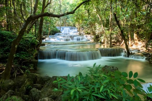 Long exposure exotic beautiful tropical deep rainforest waterfall Fresh turquoise waterfalls in deep forest of Huay Mae Khamin waterfall in the national park Beautiful landscape waterfalls.