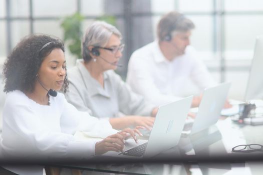 Business group working in customer and help desk office.