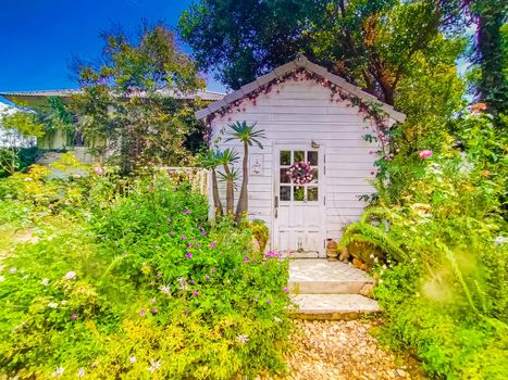 Garden cottage with beautiful blooms flower Homesthetics house idea