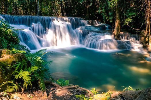 Long exposure exotic beautiful tropical deep rainforest waterfall Fresh turquoise waterfalls in deep forest of Huay Mae Khamin waterfall in the national park Beautiful landscape waterfalls.