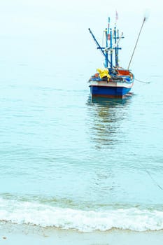 Old Wooden Boats  At The Beach  Andaman Sea, Thailand . Summer seascape with  beautiful beach warm sand .Summer wallpaper background