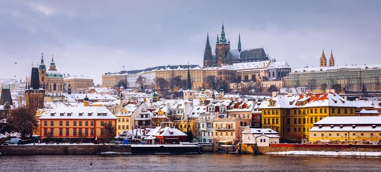 Famous historic Charles bridge in winter, Old Town bridge tower, Prague, Czech republic. Prague castle and Charles bridge, Prague (UNESCO), Czech republic.