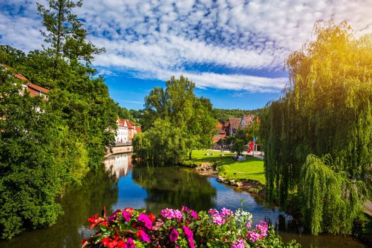 Beautiful floral colorful town Tubingen in Germany (Baden-Wurttemberg). Houses at river Neckar and Hoelderlin tower, Tuebingen, Baden-Wuerttemberg, Germany. Tubingen, Germany. 
