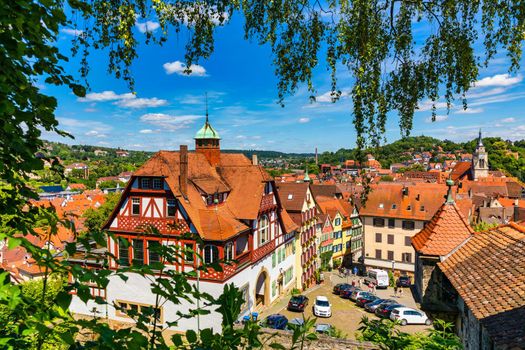 Beautiful floral colorful town Tubingen in Germany (Baden-Wurttemberg). Houses at river Neckar and Hoelderlin tower, Tuebingen, Baden-Wuerttemberg, Germany. Tubingen, Germany. 
