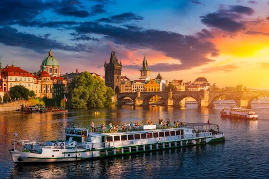 Charles Bridge in Prague in Czechia. Prague, Czech Republic. Charles Bridge (Karluv Most) and Old Town Tower. Vltava River and Charles Bridge. Concept of world travel, sightseeing and tourism.