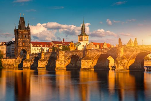 Old town of Prague. Czech Republic over river Vltava with Charles Bridge on skyline. Prague panorama landscape view with red roofs.  Prague view from Petrin Hill, Prague, Czechia.