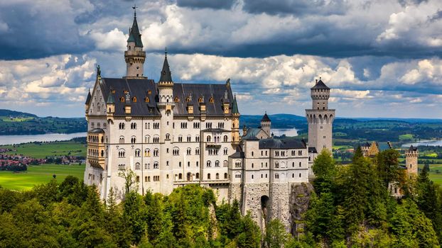Neuschwanstein Fairytale Castle near Fussen, Bavaria, Germany. View of famous Neuschwanstein Castle. Location: village of Hohenschwangau, near Fussen, southwest Bavaria, Germany, Europe