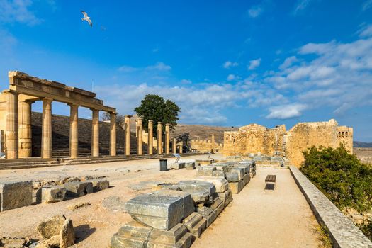 Ruins of Acropolis of Lindos view, Rhodes, Dodecanese Islands, Greek Islands, Greece. Acropolis of Lindos, ancient architecture of Rhodes, Greece. 
