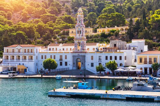 Sacred Monastery of Saint Archangel Michael the Panormitis, Symi, Greece. Monastery of Saint Archangel Michael, sacred place on coast of sea Aegean Symi island in Greece overlooking Panormitis port.