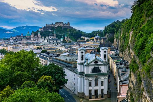 Beautiful view of the historic city of Salzburg with Festung Hohensalzburg in summer, Salzburger Land, Austria. Panoramic summer cityscape of Salzburg, Old City, birthplace of famed composer Mozart. 