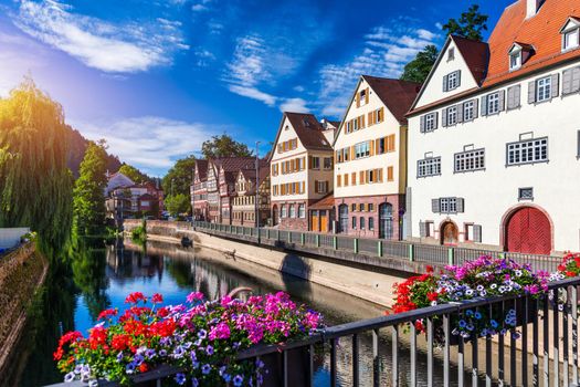 Beautiful floral colorful town Tubingen in Germany (Baden-Wurttemberg). Houses at river Neckar and Hoelderlin tower, Tuebingen, Baden-Wuerttemberg, Germany. Tubingen, Germany. 