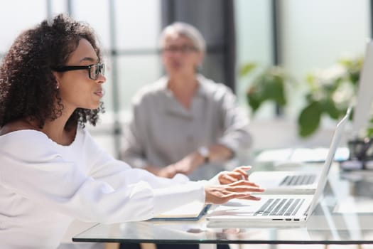 young attractive african american woman in the office