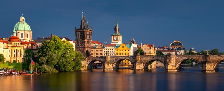 Charles Bridge sunset view of the Old Town pier architecture, Charles Bridge over Vltava river in Prague, Czechia. Old Town of Prague with Charles Bridge, Prague, Czech Republic.