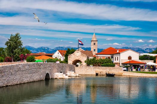 Historic town of Nin laguna view, Dalmatia region of Croatia. Street view of the famous Nin lagoon and medieval in Croatia. Colorful architecture in town of Nin, Dalmatia, Croatia