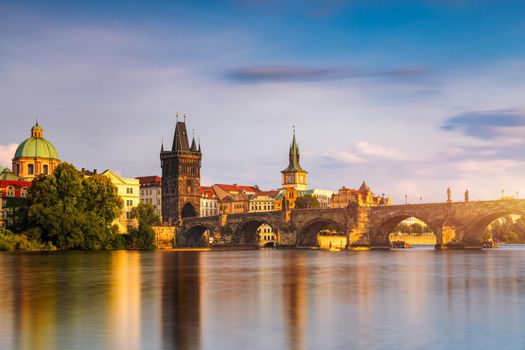 Charles Bridge sunset view of the Old Town pier architecture, Charles Bridge over Vltava river in Prague, Czechia. Old Town of Prague with Charles Bridge, Prague, Czech Republic.