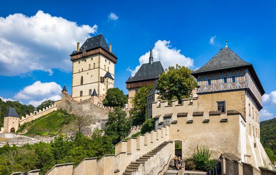 Royal Castle Karlstejn. Central Bohemia, Karlstejn village, Czechia. View of The Karlstejn castle. Royal palace founded King Charles IV. Amazing gothic monument in Czech Republic, Europe.