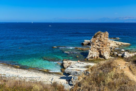 View north east coast with Kanoni and Mpataria beach, Island of Corfu, Greece. Mpataria and Kanoni beach at Corfu Greece during the day. 