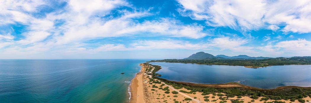 Issos beach on Corfu, near Agios Georgios, Greece. Aerial drone view of Issos beach and Lake Korission, Corfu island, Ionian Sea, Greece. Issos beach, Corfu Island.