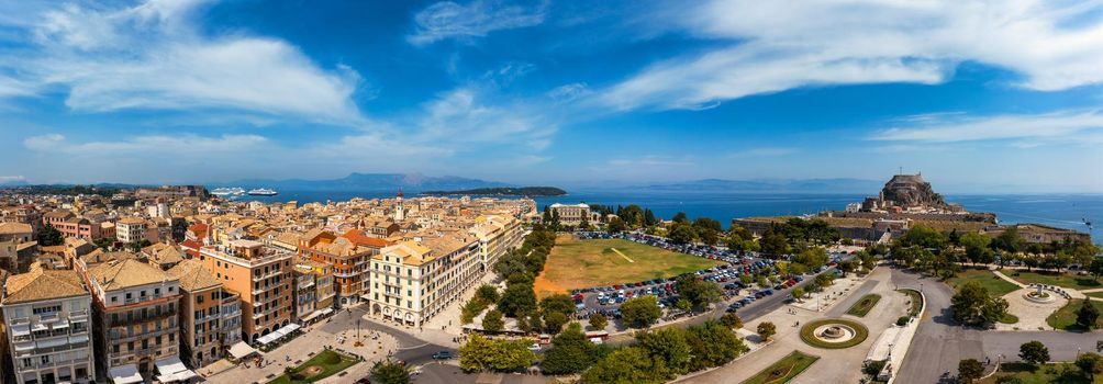 Panoramic view of Kerkyra, capital of Corfu island, Greece. Aerial drone view of Kerkyra with beautiful buildings during summer sunny day. Corfu island, Greece. 