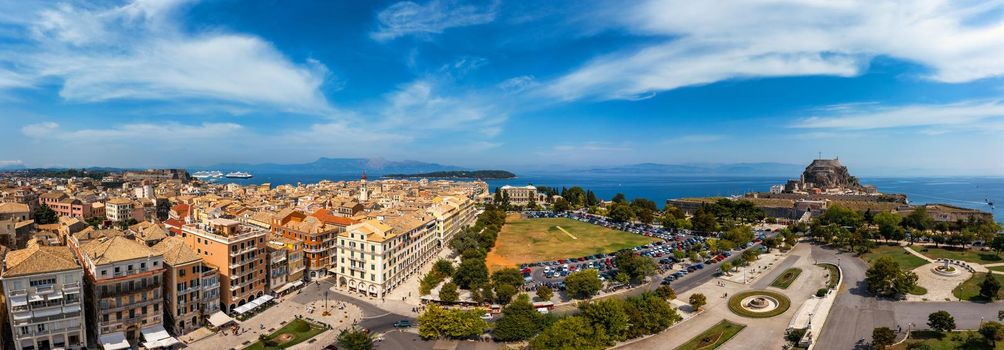 Panoramic view of Kerkyra, capital of Corfu island, Greece. Aerial drone view of Kerkyra with beautiful buildings during summer sunny day. Corfu island, Greece. 