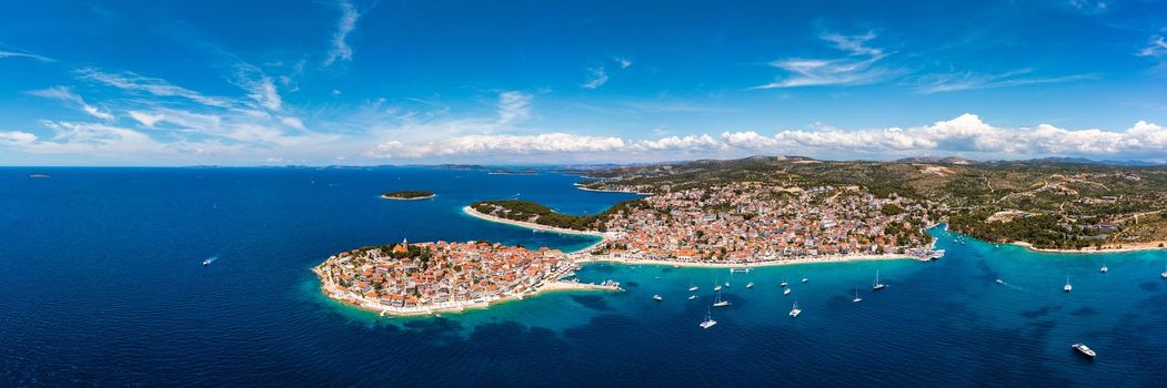 Aerial view of Primosten old town on the islet, Dalmatia, Croatia. Primosten, Sibenik Knin County, Croatia. Resort town on the Adriatic coast. Aerial view of adriatic town Primosten, Croatia