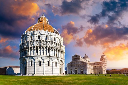 Pisa Cathedral and the Leaning Tower in a sunny day in Pisa, Italy. Pisa Cathedral with Leaning Tower of Pisa on Piazza dei Miracoli in Pisa, Tuscany, Italy.