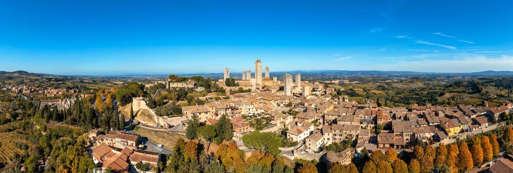 Town of San Gimignano, Tuscany, Italy with its famous medieval towers. Aerial view of the medieval village of San Gimignano, a Unesco World Heritage Site. Italy, Tuscany, Val d'Elsa.