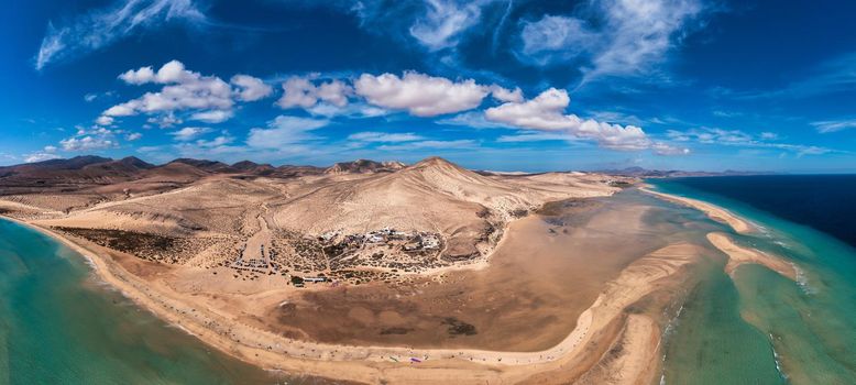 Jandia Peninsula, Risco del Paso, Playas de Sotavento and Laguna de Sotavento, Fuerteventura, Canary Islands, Spain, Atlantic, Europe. Kitesurfing flying in the ocean, Sotavento beach, Fuerteventura