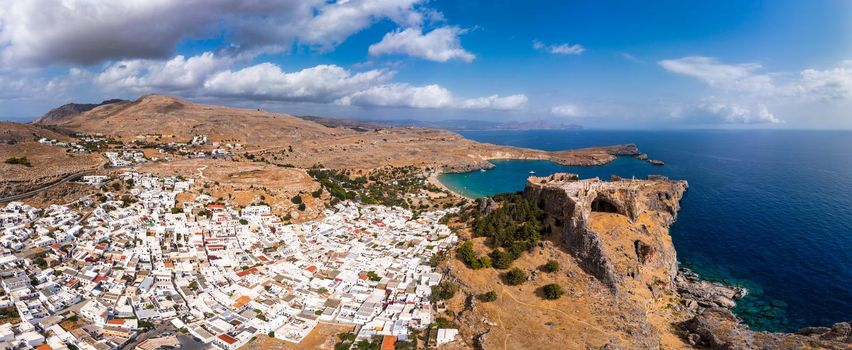 Ruins of Acropolis of Lindos view from above, Rhodes, Dodecanese Islands, Greek Islands, Greece. Acropolis of Lindos, ancient architecture of Rhodes, Greece. 