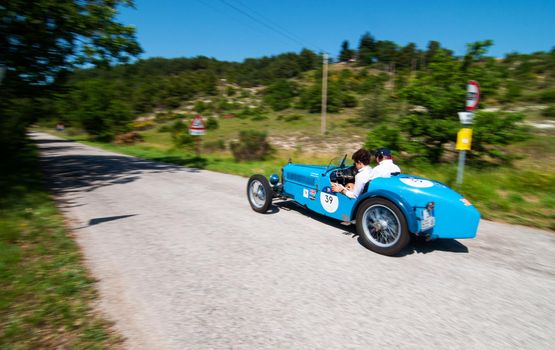 URBINO - ITALY - JUN 16 - 2022 : RALLY ABC 1100 1928 on an old racing car in rally Mille MigLIA