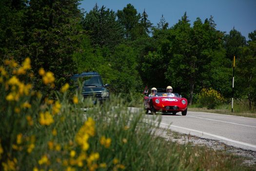 URBINO - ITALY - JUN 16 - 2022 : O.S.C.A. MT4 1350 2AD 1955 on an old racing car in rally Mille Miglia 2022 the famous italian historical race (1927-1957 on an old racing car in rally Mille Miglia 2022 the famous italian historical race (1927-1957