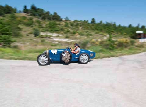 URBINO - ITALY - JUN 16 - 2022 : BUGATTI T37 1926 on an old racing car in rally Mille MigLIA