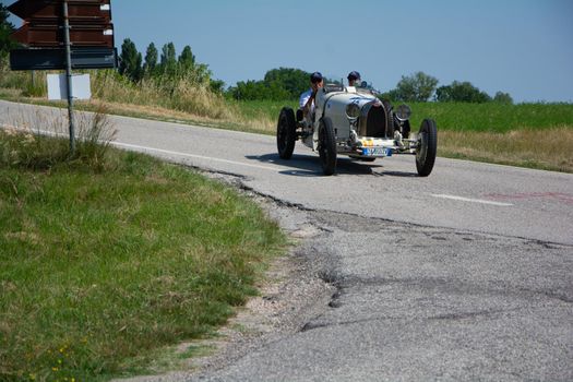 URBINO - ITALY - JUN 16 - 2022 : LANCIA LAMBA V SERIE CASARO 1925 on an old racing car in rally Mille Miglia 2022 the famous italian historical race (1927-1957