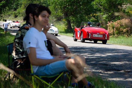 URBINO - ITALY - JUN 16 - 2022 : TRIUMPH TR3 SPORTS 1957 on an old racing car in rally Mille Miglia 2022 the famous italian historical race (1927-1957