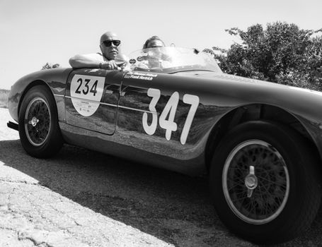 URBINO - ITALY - JUN 16 - 2022 : ERMINI GILCO 1100 MOTTO 1952 on an old racing car in rally Mille Miglia 2022 the famous italian historical race (1927-1957