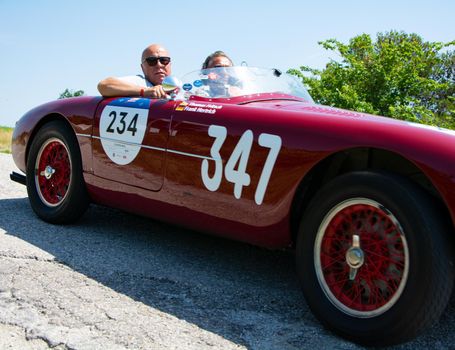 URBINO - ITALY - JUN 16 - 2022 : ERMINI GILCO 1100 MOTTO 1952 on an old racing car in rally Mille Miglia 2022 the famous italian historical race (1927-1957