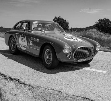 URBINO - ITALY - JUN 16 - 2022 : FERRARI 195 INTER COUPE GHIA 1951 on an old racing car in rally Mille Miglia 2022 the famous italian historical race (1927-1957