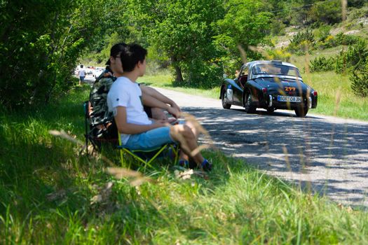 URBINO - ITALY - JUN 16 - 2022 : TRIUMPH TR2 SPORTS 1955 on an old racing car in rally Mille Miglia 2022 the famous italian historical race (1927-1957