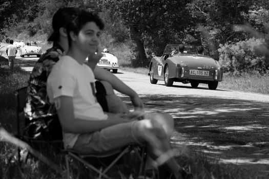 URBINO - ITALY - JUN 16 - 2022 : TRIUMPH TR3 SPORTS 1957 on an old racing car in rally Mille Miglia 2022 the famous italian historical race (1927-1957