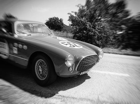 URBINO - ITALY - JUN 16 - 2022 : FERRARI 195 INTER COUPE GHIA 1951 on an old racing car in rally Mille Miglia 2022 the famous italian historical race (1927-1957