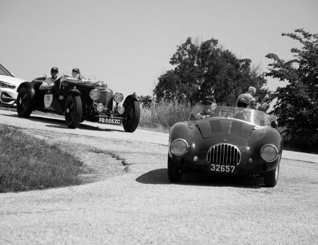 URBINO - ITALY - JUN 16 - 2022 : O.S.C.A. MT4 1350 2AD 1955 on an old racing car in rally Mille Miglia 2022 the famous italian historical race (1927-1957