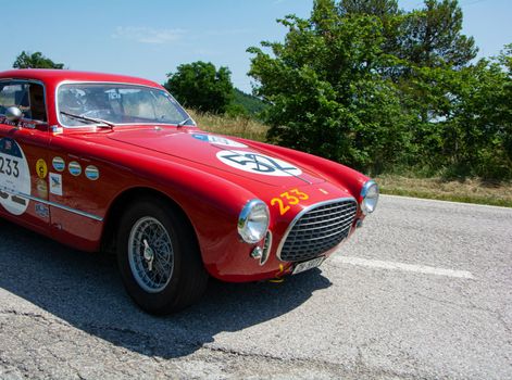 URBINO - ITALY - JUN 16 - 2022 : FERRARI 195 INTER COUPE GHIA 1951 on an old racing car in rally Mille Miglia 2022 the famous italian historical race (1927-1957