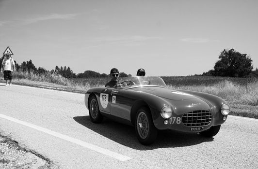 URBINO - ITALY - JUN 16 - 2022 : ERMINI FIAT CISITALIA GILCO 1100 SPORT 1950 on an old racing car in rally Mille Miglia 2022 the famous italian historical race (1927-1957