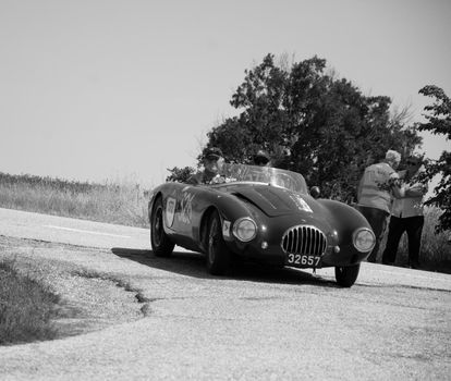 URBINO - ITALY - JUN 16 - 2022 : O.S.C.A. MT4 1350 2AD 1955 on an old racing car in rally Mille Miglia 2022 the famous italian historical race (1927-1957