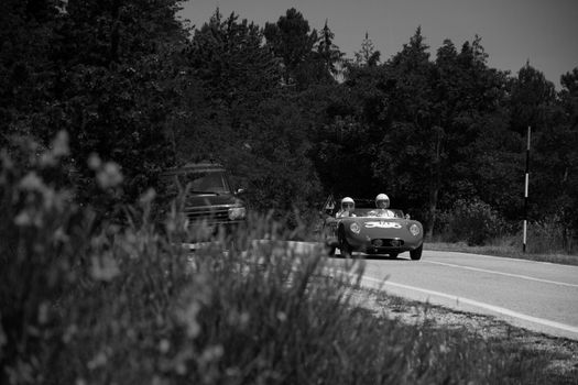 URBINO - ITALY - JUN 16 - 2022 : O.S.C.A. MT4 1350 2AD 1955 on an old racing car in rally Mille Miglia 2022 the famous italian historical race (1927-1957 on an old racing car in rally Mille Miglia 2022 the famous italian historical race (1927-1957