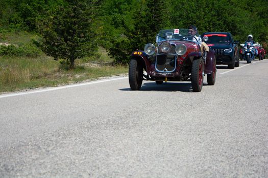 URBINO - ITALY - JUN 16 - 2022 : FIAT 514 MM 1930 on an old racing car in rally Mille Miglia 2022 the famous italian historical race (1927-1957