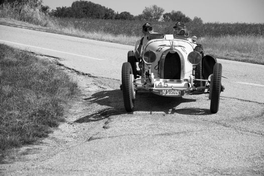 URBINO - ITALY - JUN 16 - 2022 : LANCIA LAMBA V SERIE CASARO 1925 on an old racing car in rally Mille Miglia 2022 the famous italian historical race (1927-1957