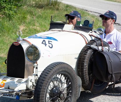 URBINO - ITALY - JUN 16 - 2022 : LANCIA LAMBA V SERIE CASARO 1925 on an old racing car in rally Mille Miglia 2022 the famous italian historical race (1927-1957