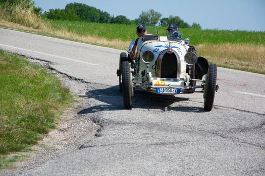 URBINO - ITALY - JUN 16 - 2022 : LANCIA LAMBA V SERIE CASARO 1925 on an old racing car in rally Mille Miglia 2022 the famous italian historical race (1927-1957